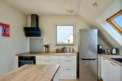 Cuisine ou kitchenette dans l'établissement Ty Jamamo - A 500m de la plage