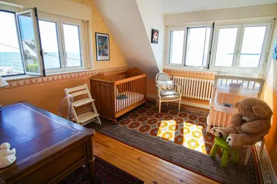 Coin salon dans l'établissement -AVEL DRO- Belle maison familiale vue mer corniche