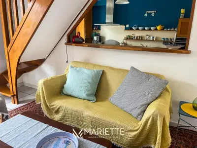 Coin salon dans l'établissement -L'ABRI CÔTIER- MAISON CABELLOU Á 300 M DE LA MER