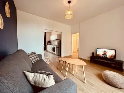 Télévision ou salle de divertissement dans l'établissement L'Ethnique - Home Homy