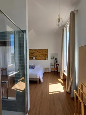Un ou plusieurs lits dans un hébergement de l'établissement Ty Monde - Chambres d'hôtes en Finistère