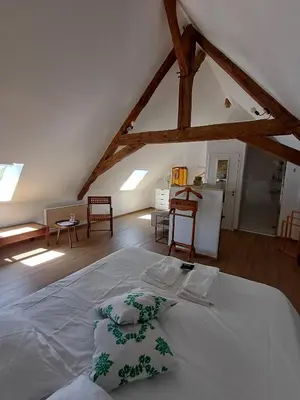 Un ou plusieurs lits dans un hébergement de l'établissement Ty Monde - Chambres d'hôtes en Finistère