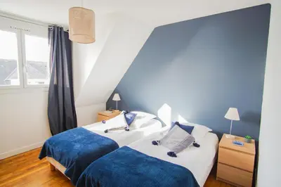 Un ou plusieurs lits dans un hébergement de l'établissement -FRESNEL- MAISON DE BORD DE MER - GRANDE TERRASSE
