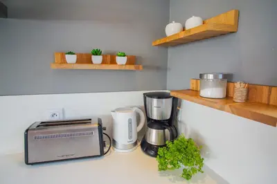 Cuisine ou kitchenette dans l'établissement -FRESNEL- MAISON DE BORD DE MER - GRANDE TERRASSE