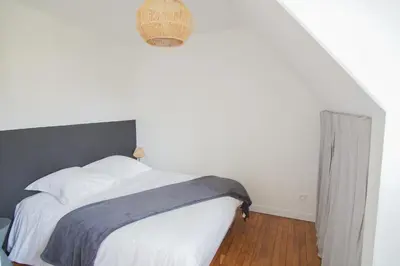 Un ou plusieurs lits dans un hébergement de l'établissement -FRESNEL- MAISON DE BORD DE MER - GRANDE TERRASSE