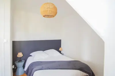 Un ou plusieurs lits dans un hébergement de l'établissement -FRESNEL- MAISON DE BORD DE MER - GRANDE TERRASSE