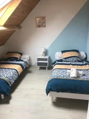 Un ou plusieurs lits dans un hébergement de l'établissement Villa Roz Veur