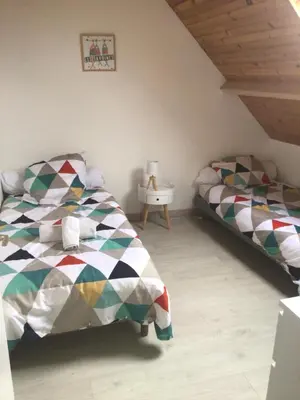 Un ou plusieurs lits dans un hébergement de l'établissement Villa Roz Veur