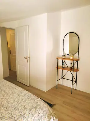 Un ou plusieurs lits dans un hébergement de l'établissement Cosy Appartement Hyper Centre-Ville