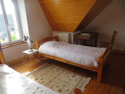 Un ou plusieurs lits dans un hébergement de l'établissement Villa Crozon 6 à 8 pers vue mer