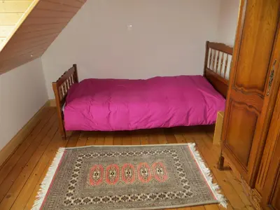 Un ou plusieurs lits dans un hébergement de l'établissement Villa Crozon 6 à 8 pers vue mer
