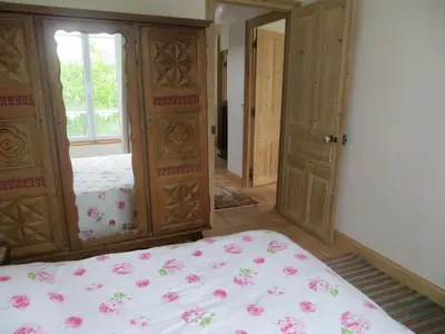 Un ou plusieurs lits dans un hébergement de l'établissement Villa Crozon 6 à 8 pers vue mer