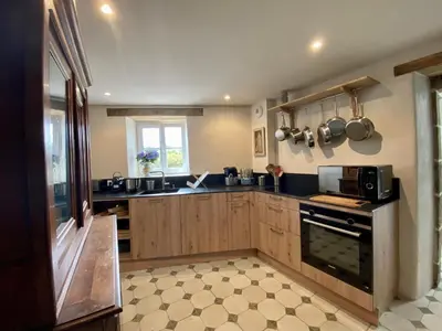 Cuisine ou kitchenette dans l'établissement Le Presbytère