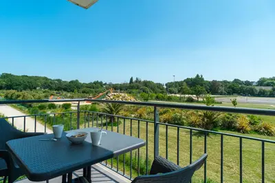 Balcon ou terrasse dans l'établissement Les Thermes 515 - Appt avec piscine partagée
