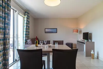 Cuisine ou kitchenette dans l'établissement Les Thermes 515 - Appt avec piscine partagée
