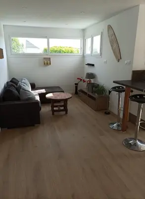 Coin salon dans l'établissement Appart 7 min de la mer+jardin