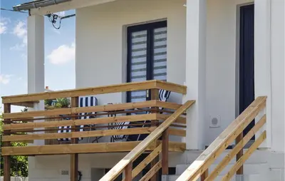 Balcon ou terrasse dans l'établissement Belle Maison 450 M De La Plage