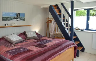Un ou plusieurs lits dans un hébergement de l'établissement Belle Maison 450 M De La Plage