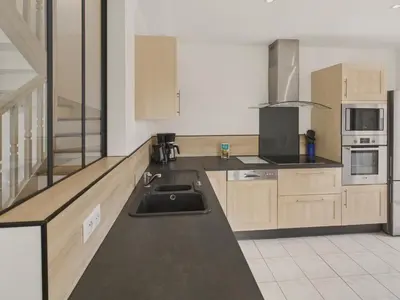 Cuisine ou kitchenette dans l'établissement Plage de la Grève Blanche à 600m - Maison pour 8