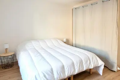 Un ou plusieurs lits dans un hébergement de l'établissement À 100m du port de Loctudy, bel appartement pour 6