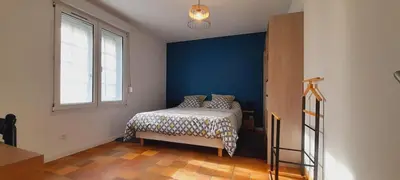 Un ou plusieurs lits dans un hébergement de l'établissement La Bonne Etoile - Chambres d'hôtes et Appartements -