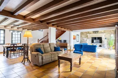 Coin salon dans l'établissement La Bonne Etoile - Chambres d'hôtes et Appartements -