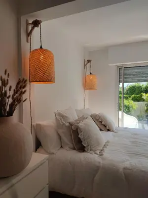 Un ou plusieurs lits dans un hébergement de l'établissement La suite appartement plages et centre ville a pied