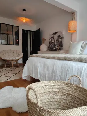 Un ou plusieurs lits dans un hébergement de l'établissement La suite appartement plages et centre ville a pied