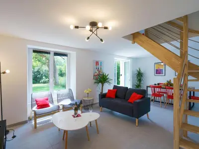 Coin salon dans l'établissement Holiday Home Penhors by Interhome