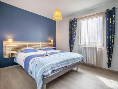 Un ou plusieurs lits dans un hébergement de l'établissement Holiday Home Les Agapanthes by Interhome