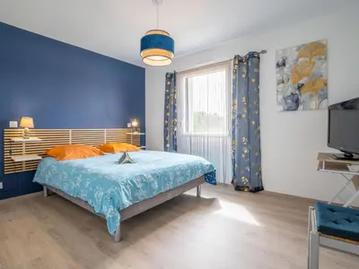 Un ou plusieurs lits dans un hébergement de l'établissement Holiday Home Les Agapanthes by Interhome