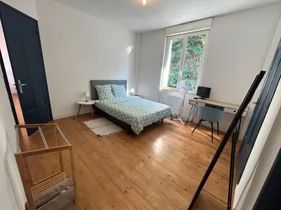 Un ou plusieurs lits dans un hébergement de l'établissement Appartement confortable de 80m2 Centre ville de Quimper & Parking privé