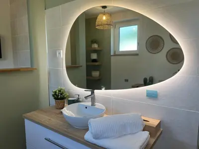 Salle de bains dans l'établissement Cottage à la campagne