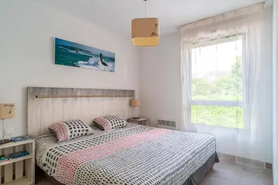 Un ou plusieurs lits dans un hébergement de l'établissement Le Kichen - Appt proche de la plage