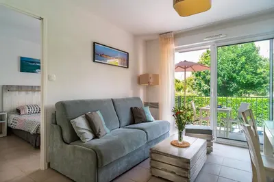 Coin salon dans l'établissement Le Kichen - Appt proche de la plage