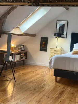 Un ou plusieurs lits dans un hébergement de l'établissement Wanatan Chambre Deluxe
