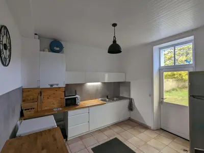 Cuisine ou kitchenette dans l'établissement Un rêve à la mer
