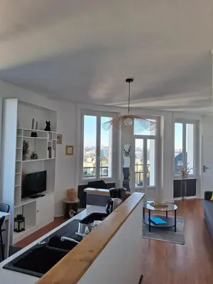 Télévision ou salle de divertissement dans l'établissement Appartement lumineux dans les hauts de Recouvrance