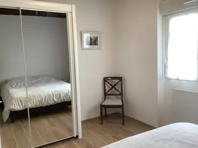 Un ou plusieurs lits dans un hébergement de l'établissement Villa bord de mer