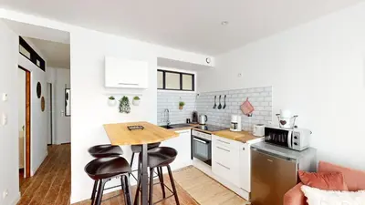 Cuisine ou kitchenette dans l'établissement Rose des sables