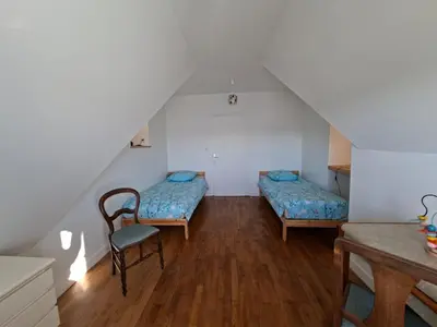 Un ou plusieurs lits dans un hébergement de l'établissement Maison Familiale Locquirec -Vue Mer - 6 chambres - 11personnes - Bretagne - Finistère Nord