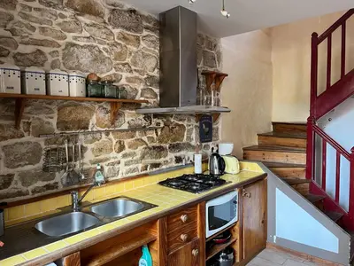 Cuisine ou kitchenette dans l'établissement Le Passage