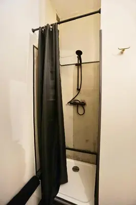 Salle de bains dans l'établissement L'Iconique
