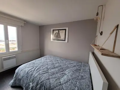 Un ou plusieurs lits dans un hébergement de l'établissement Beach House - jusqu'à 5 personnes