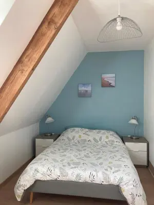 Un ou plusieurs lits dans un hébergement de l'établissement Gîte de Kermoal-Maison 2 chambres