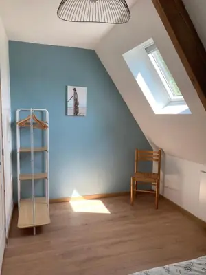 Un ou plusieurs lits dans un hébergement de l'établissement Gîte de Kermoal-Maison 2 chambres
