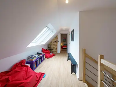 Télévision ou salle de divertissement dans l'établissement Holiday Home Pointe du Raz by Interhome