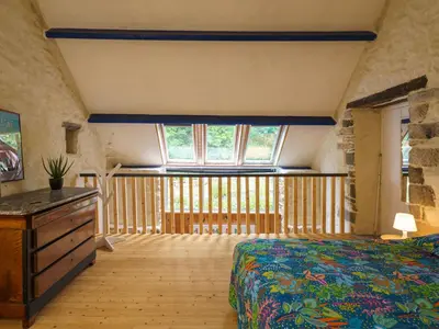 Un ou plusieurs lits dans un hébergement de l'établissement Holiday Home La Torche by Interhome