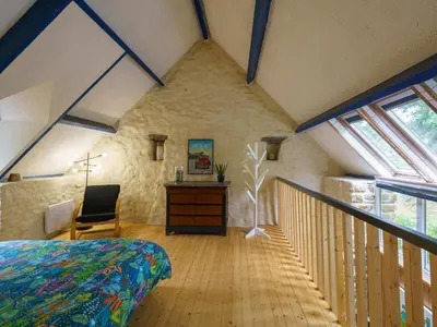 Un ou plusieurs lits dans un hébergement de l'établissement Holiday Home La Torche by Interhome