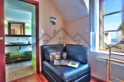 Coin salon dans l'établissement LocaLise - M11B - A la pointe - Maison de vacances avec jardin entièrement clos - A 50m de la plage - 700m du centre - tout à pied - wifi inclus - draps inclus - Animaux bienvenus